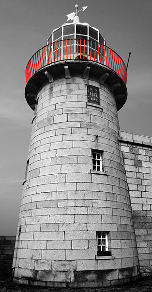 Beacon: Lighthouse at Howth - coast of Northern Co. Dublin, Ireland.