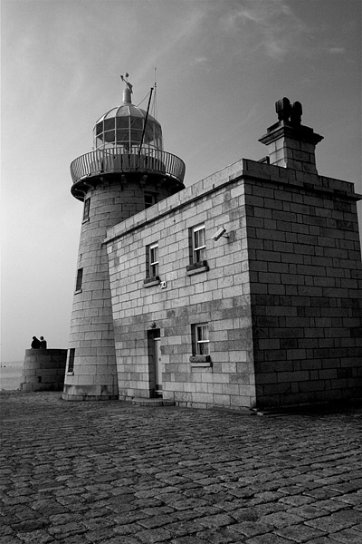 Leans: Lighthouse at Howth - coast of Northern Co. Dublin, Ireland.